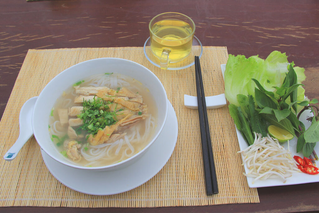 Chicken noodle soup "Pho Ga" for breakfast
